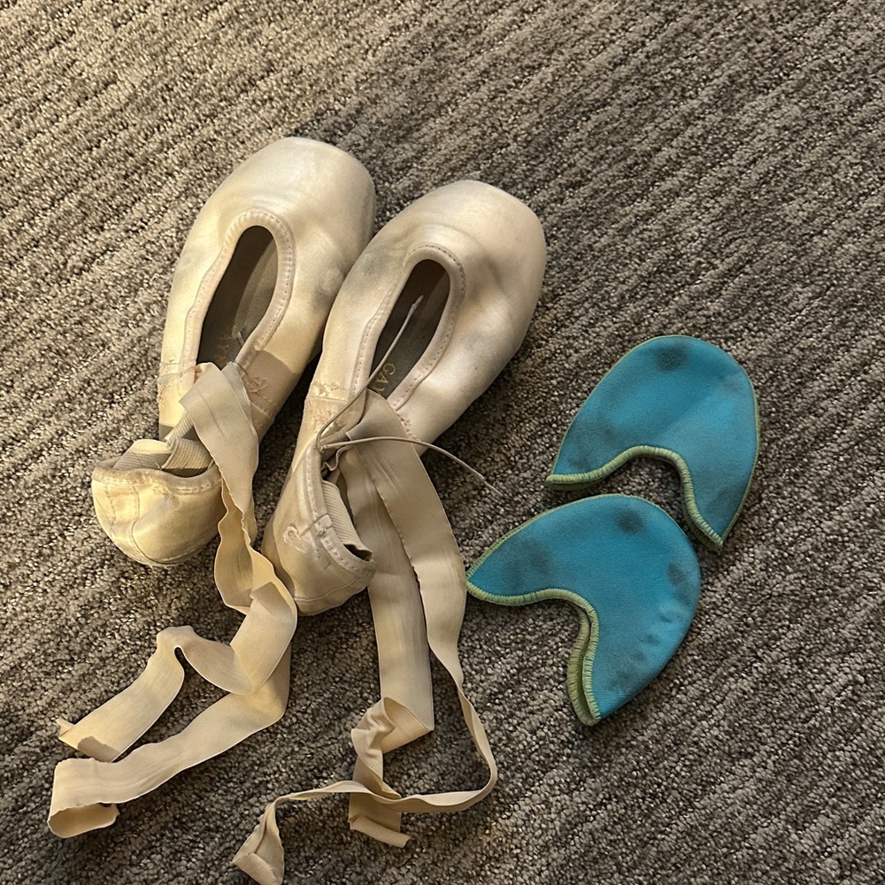 Used pointe shoe and toe pads